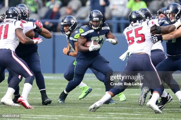 Eddie Lacy of the Seattle Seahawks runs with the ball during the game against the Houston Texans at CenturyLink Field on October 29, 2017 in Seattle,...