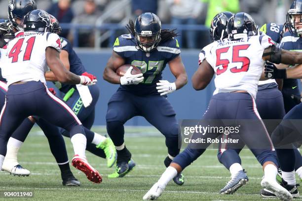 Eddie Lacy of the Seattle Seahawks runs with the ball during the game against the Houston Texans at CenturyLink Field on October 29, 2017 in Seattle,...