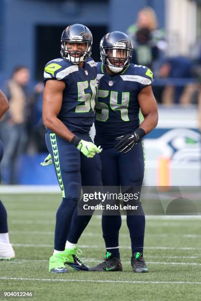 Wright and Bobby Wagner of the Seattle Seahawks look on during the game against the Houston Texans at CenturyLink Field on October 29, 2017 in...