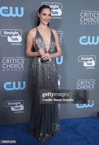 Actor Gal Gadot, recipient of the Best Action Movie award for "Wonder Woman', pose in the press room during The 23rd Annual Critics' Choice Awards at...