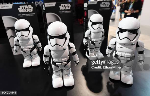 Star Wars First Order Stormtrooper app-enabled bipedal robots by UBTECH are displayed during CES 2018 at the Las Vegas Convention Center on January...