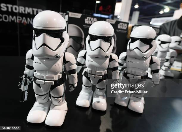 Star Wars First Order Stormtrooper app-enabled bipedal robots by UBTECH are displayed during CES 2018 at the Las Vegas Convention Center on January...
