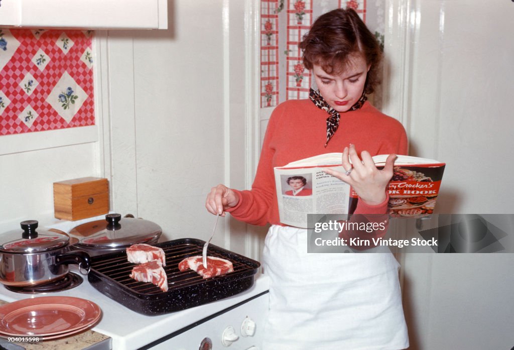 Young woman in the kitchen, ca. 1956.