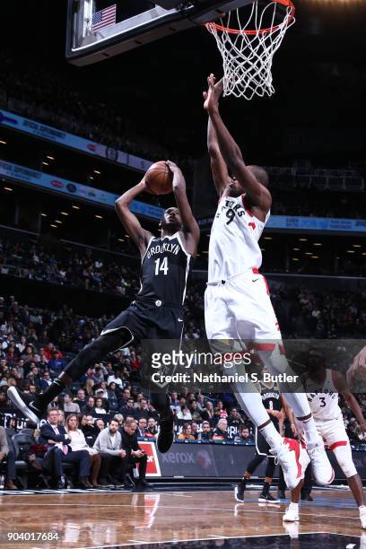 Milton Doyle of the Brooklyn Nets shoots the ball during the game against the Toronto Raptors on January 8, 2018 at Barclays Center in Brooklyn, New...