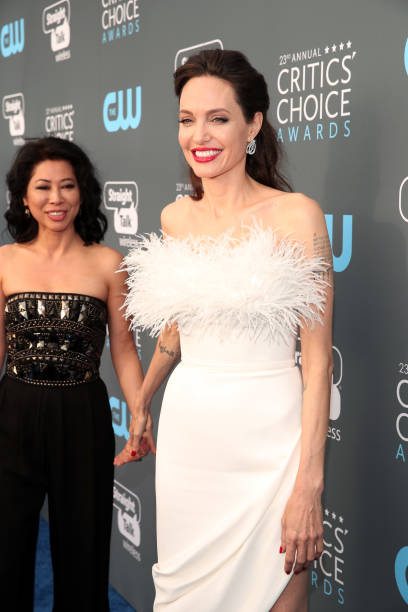 Writer Loung Ung and actor/director Angelina Jolie attend The 23rd Annual Critics' Choice Awards at Barker Hangar on January 11, 2018 in Santa...