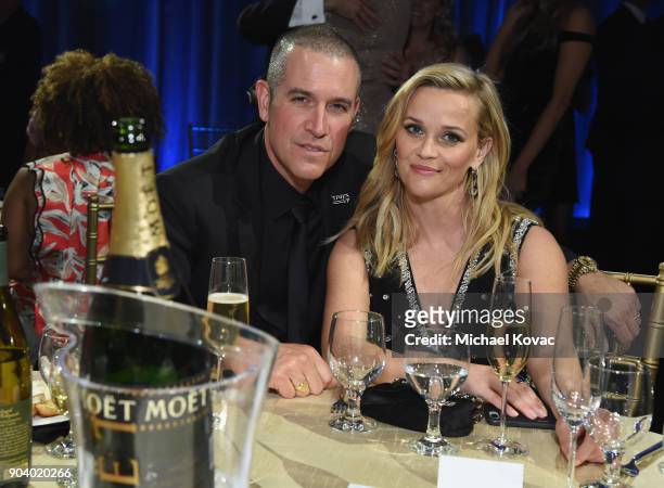 Talent agent Jim Toth and actor-producer Reese Witherspoon attend Moet & Chandon celebrate The 23rd Annual Critics' Choice Awards at Barker Hangar on...
