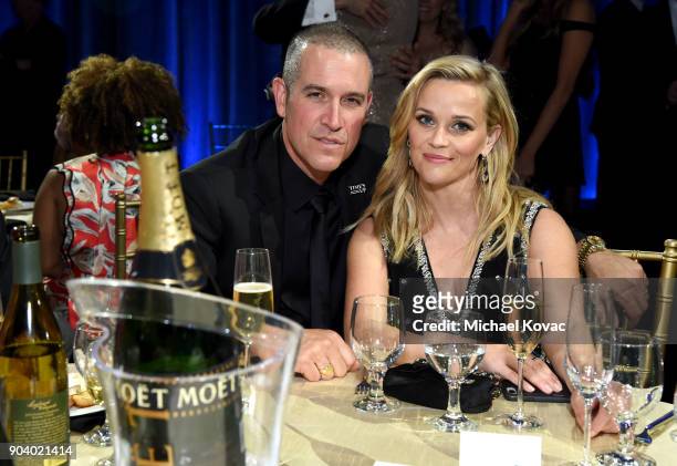 Talent agent Jim Toth and producer-actor Reese Witherspoon attend Moet & Chandon celebrate The 23rd Annual Critics' Choice Awards at Barker Hangar on...