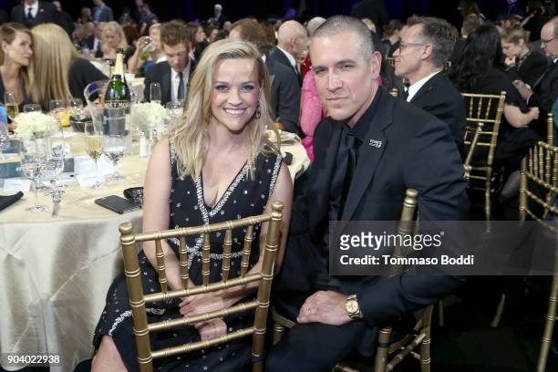 Actor Reese Witherspoon and Jim Toth attends the 23rd Annual Critics' Choice Awards on January 11, 2018 in Santa Monica, California.