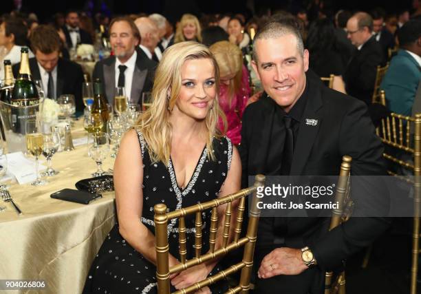 Actor Reese Witherspoon and Jim Toth attend the 23rd Annual Critics' Choice Awards on January 11, 2018 in Santa Monica, California.