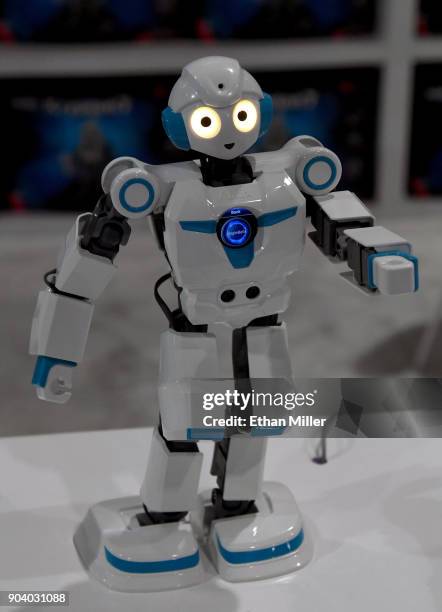 An Everest 4 humanoid series educational robot by Abilix "dances" during CES 2018 at the Las Vegas Convention Center on January 11, 2018 in Las...