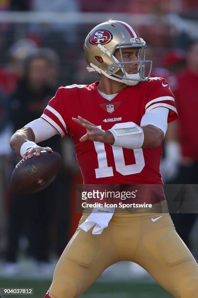 San Francisco 49ers quarterback Jimmy Garoppolo drops back to pass during the San Francisco 49ers game versus the Tennessee Titans on Sunday, Dec. 17...