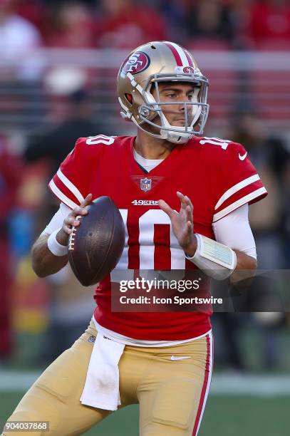 San Francisco 49ers quarterback Jimmy Garoppolo looks to pass during the San Francisco 49ers game versus the Tennessee Titans on Sunday, Dec. 17 at...