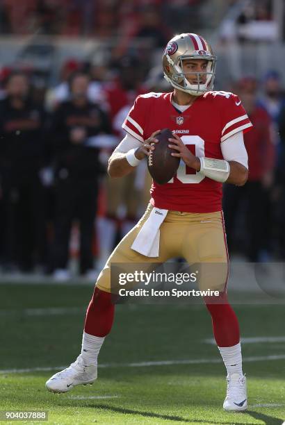 San Francisco 49ers quarterback Jimmy Garoppolo looks to pass during the San Francisco 49ers game versus the Tennessee Titans on Sunday, Dec. 17 at...