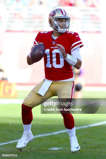 San Francisco 49ers quarterback Jimmy Garoppolo looks to pass during the San Francisco 49ers game versus the Tennessee Titans on Sunday, Dec. 17 at...