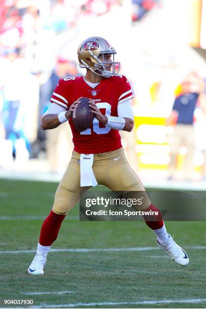 San Francisco 49ers quarterback Jimmy Garoppolo looks to pass during the San Francisco 49ers game versus the Tennessee Titans on Sunday, Dec. 17 at...