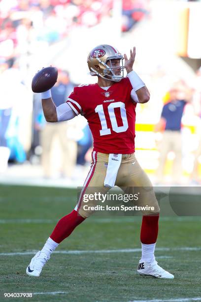 San Francisco 49ers quarterback Jimmy Garoppolo looks to pass during the San Francisco 49ers game versus the Tennessee Titans on Sunday, Dec. 17 at...