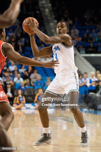 Bruins guard Kris Wilkes passes the ball during the game between the Utah Utes and the UCLA Bruines on January 11 at Pauley Pavilion in Los Angeles,...