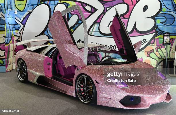 Fully Swarovski covered Lamborghini displayed at LYZER booth during Tokyo Auto Salon 2018 at Makuhari Messe on January 12, 2018 in Chiba, Japan.