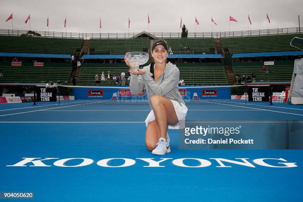 Belinda Bencic of Switzerland poses for a photo after defeating Andrea Petkovic of Germany in the WOmenb's Singles Final during day four of the 2018...