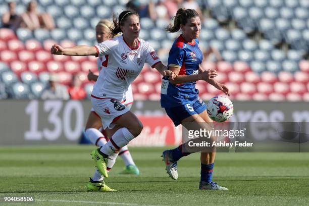 Arin Gilliland of the Jets controls the ball ahead of Adelaide defence during the round 11 W-League match between the Newcastle Jets and Adelaide...