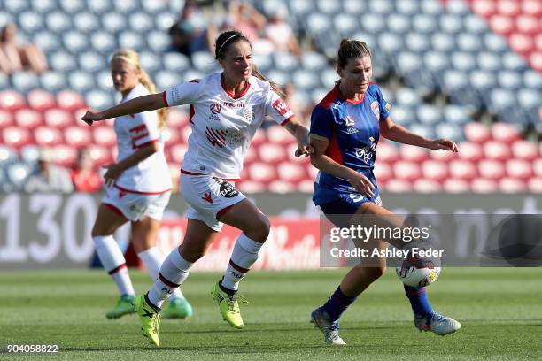 Arin Gilliland of the Jets controls the ball ahead of Adelaide United defence during the round 11 W-League match between the Newcastle Jets and...