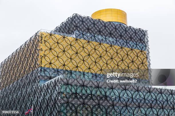 union jack under the library of birmingham - european union abstract stock-fotos und bilder