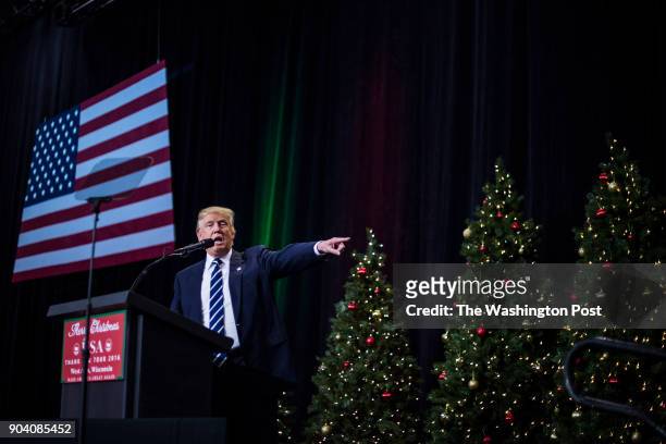 President-Elect Donald J. Trump surrounded by christmas trees speaks during a "USA Thank You Tour 2016" event in West Allis, WI on Tuesday, Dec. 13,...