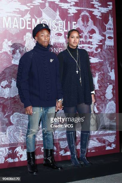 American rapper Pharrell Williams and wife Helen Lasichanh attend the CHANEL 'Mademoiselle Prive' Exhibition Opening Event on January 11, 2018 in...