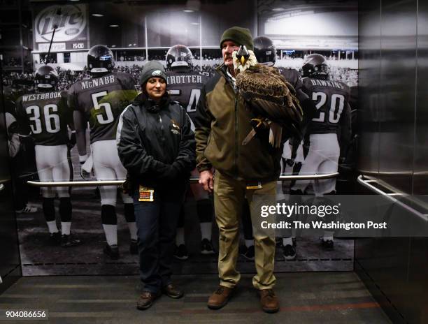 Avian Operations Coordinator Michelle Bauer and curator Spencer Williams take Challenger, a non-releasable bald eagle, on an elevator ride to an...