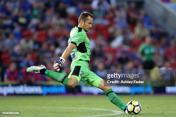 Glen Moss of the Jets kicks out from goal during the round 16 A-League match between the Newcastle Jets and the Brisbane Roar at McDonald Jones...