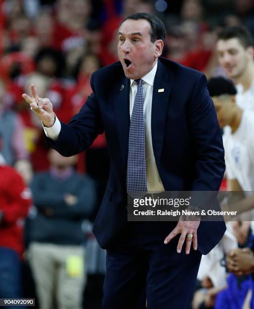 Duke head coach Mike Krzyzewski yells to his team during the first half against North Carolina State at the PNC Arena in Raleigh, N.C., on January 6,...