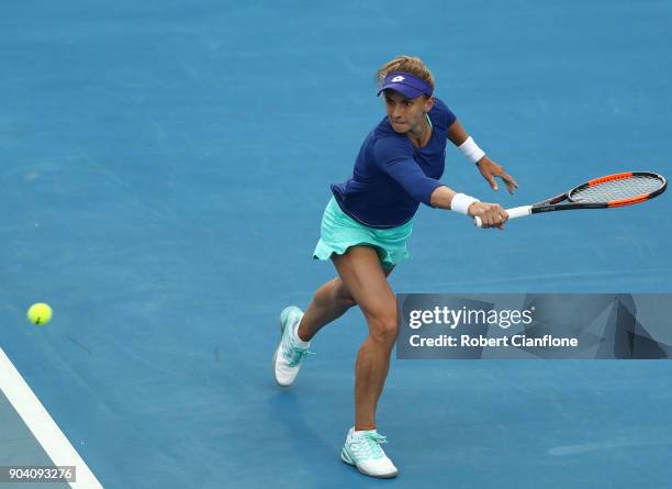 Lesia Tsurenko of the Ukraine plays a backhand during the semi finals singles match against Mihaela Buzarnescu of Romania during the 2018 Hobart...