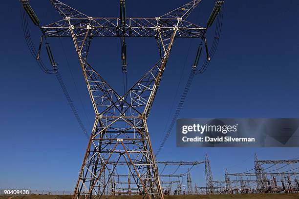 High-voltage power lines carry electricity from the Itaipu Dam hydroelectric plant, which sits on the Iguazu River a short distance downstream from...