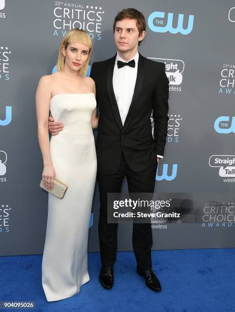 Emma Roberts, Evan Peters arrives at the The 23rd Annual Critics' Choice Awards at Barker Hangar on January 11, 2018 in Santa Monica, California.