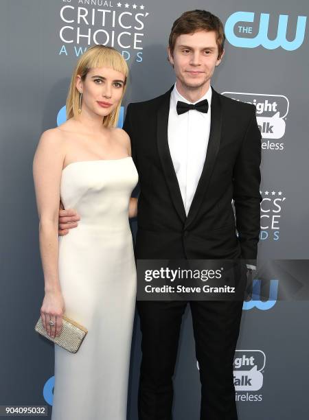 Emma Roberts, Evan Peters arrives at the The 23rd Annual Critics' Choice Awards at Barker Hangar on January 11, 2018 in Santa Monica, California.