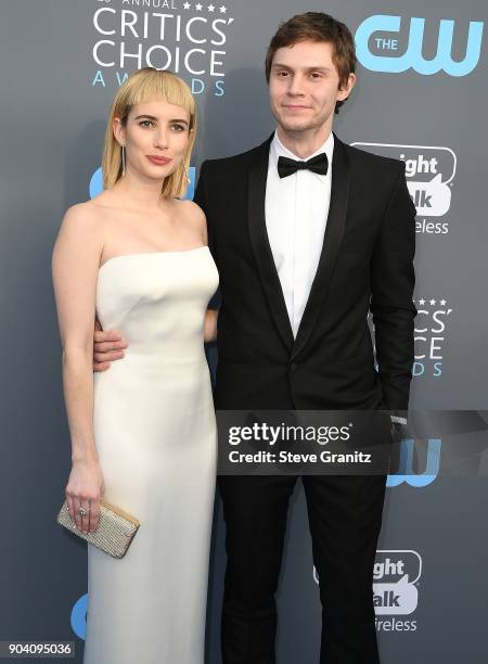 Emma Roberts, Evan Peters arrives at the The 23rd Annual Critics' Choice Awards at Barker Hangar on January 11, 2018 in Santa Monica, California.