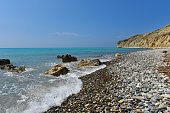 Summer vacation concept. Beach and turquoise sea water. Pissouri bay, Cyprus island