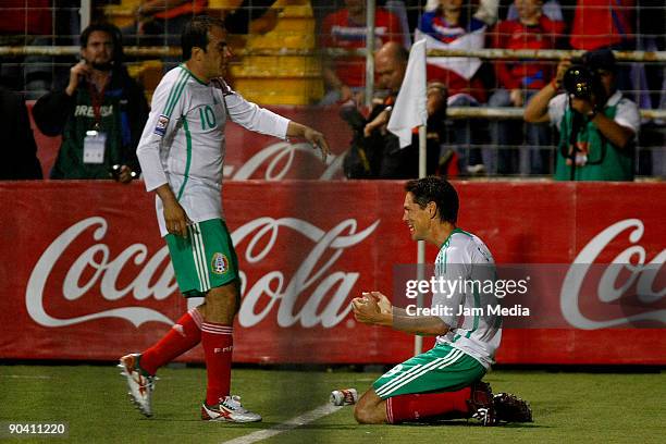 Guillermo Franco of Mexico celebrates with teammate Cuauhtemoc Blanco after scoring against Costa Rica in a FIFA 2010 World Cup qualifier at the...