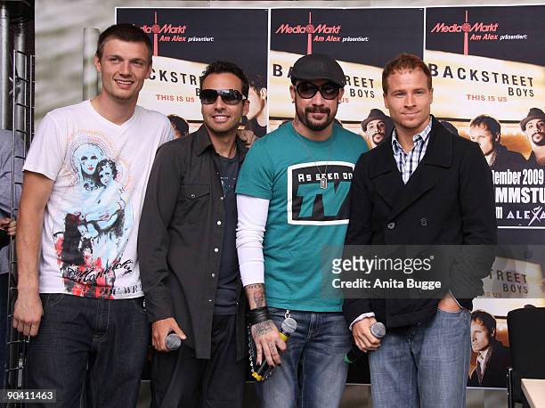 Howie Dorough, Nick Carter; AJ Mclean and Brian Littrell of the Backstreet Boys pose for the photographers prior to their autograph session on...