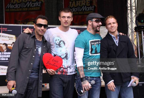 Howie Dorough, Nick Carter, AJ Mclean and Brian Littrell of the Backstreet Boys pose for the photographers prior to their autograph session on...