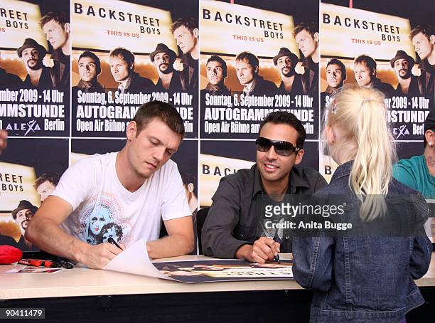 Nick Carter and Howie Dorough of the Backstreet Boys attend a autograph session on September 6, 2009 in Berlin, Germany.