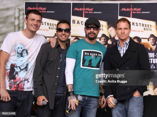 Howie Dorough, Nick Carter; AJ Mclean and Brian Littrell of the Backstreet Boys pose for the photographers prior to their autograph session on...