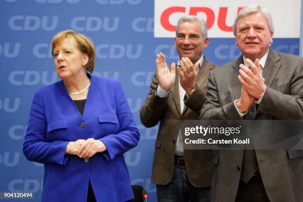 Volker Bouffier, , Prime Minister of the Federal State of Hessen, and Thomas Strobl applaud German Chancellor and leader of the German Christian...