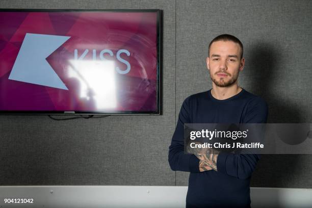 Liam Payne poses for a photograph as Liam Payne and Rita Ora visit KISS FM at Bauer Radio on January 12, 2018 in London, England.
