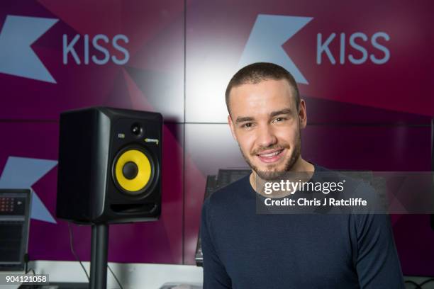 Liam Payne poses for a photograph as Liam Payne and Rita Ora visit KISS FM at Bauer Radio on January 12, 2018 in London, England.