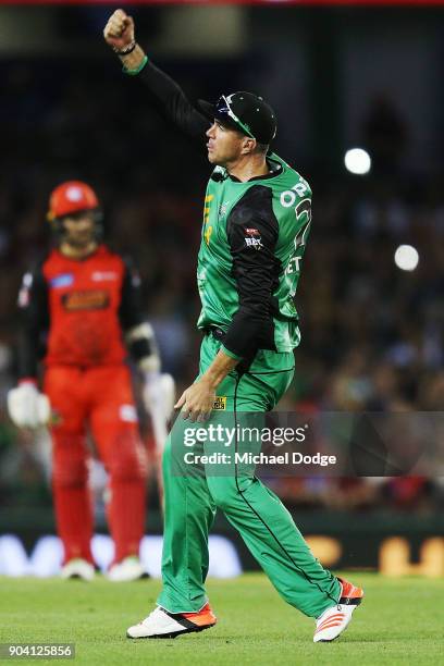 Kevin Pietersen of the Stars celebrates a spectacular diving catch to dismiss Tom Cooper of the Renegades during the Big Bash League match between...