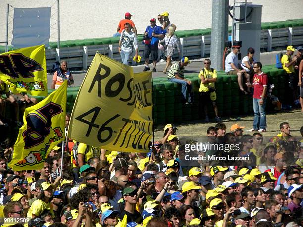 Fans celebrate on the track after the victory of Valentino Rossi of Italy and Fiat Yamaha during the MotoGP of San Marino on September 6, 2009 in San...