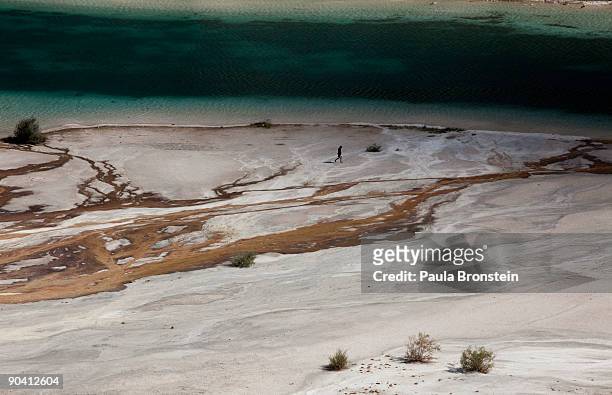 Man walks along the edge of one of the six lakes that make up Band-E-Amir National Park September 6, 2009 in Band-E-Amir, Afghanistan. Located in the...