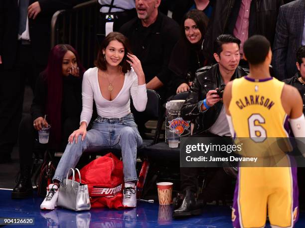 Bella Hadid is seen watching Jordan Clarkson during the New York Knicks Vs Los Angeles Lakers game at Madison Square Garden on December 12, 2017 in...