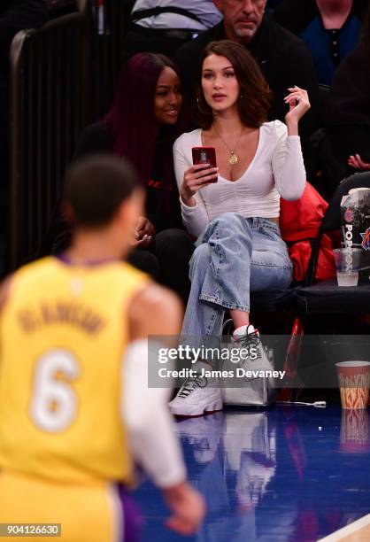 Bella Hadid is seen watching Jordan Clarkson during the New York Knicks Vs Los Angeles Lakers game at Madison Square Garden on December 12, 2017 in...